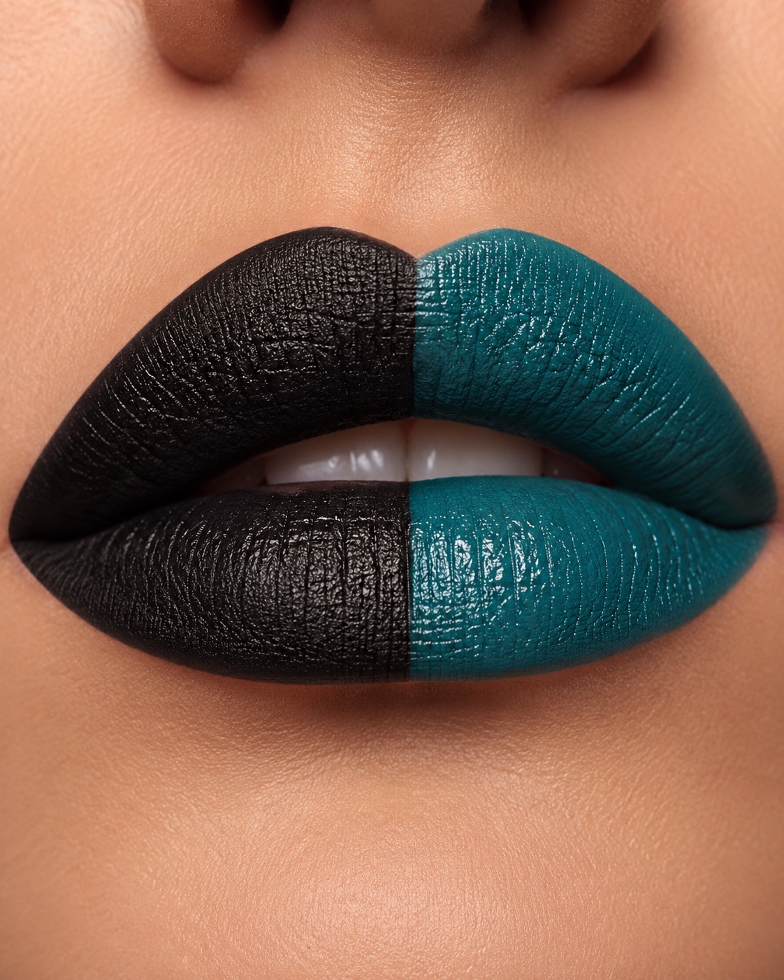 Black and white beauty portrait with teal lips for refreshed facial aesthetics
